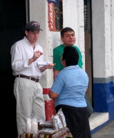Tim Hart (left) with a small business owner in Mazatenango, Guatemala.